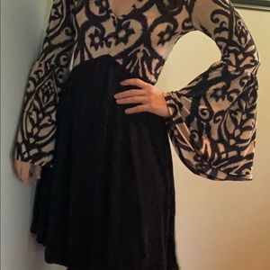 Stretchy, comfortable damask dress - size small.